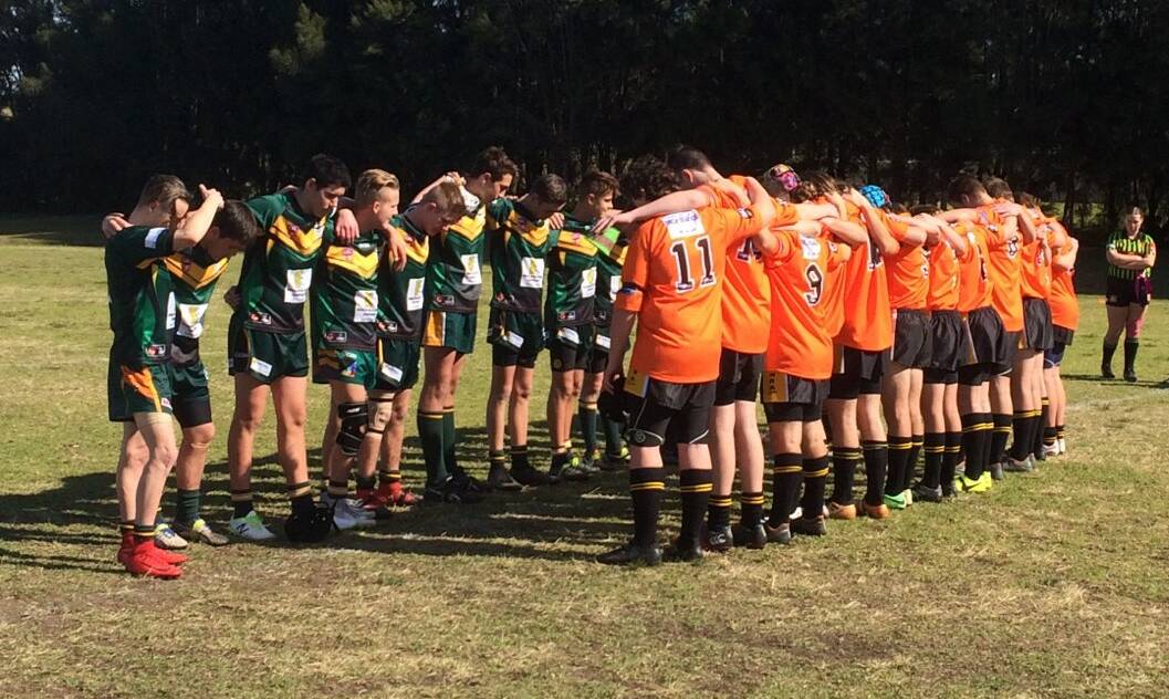 Minute's silence:  Nowra Warriors Under 16’s honour the late club life member, Les Harris, during the latest round of Group Seven Rugby league.