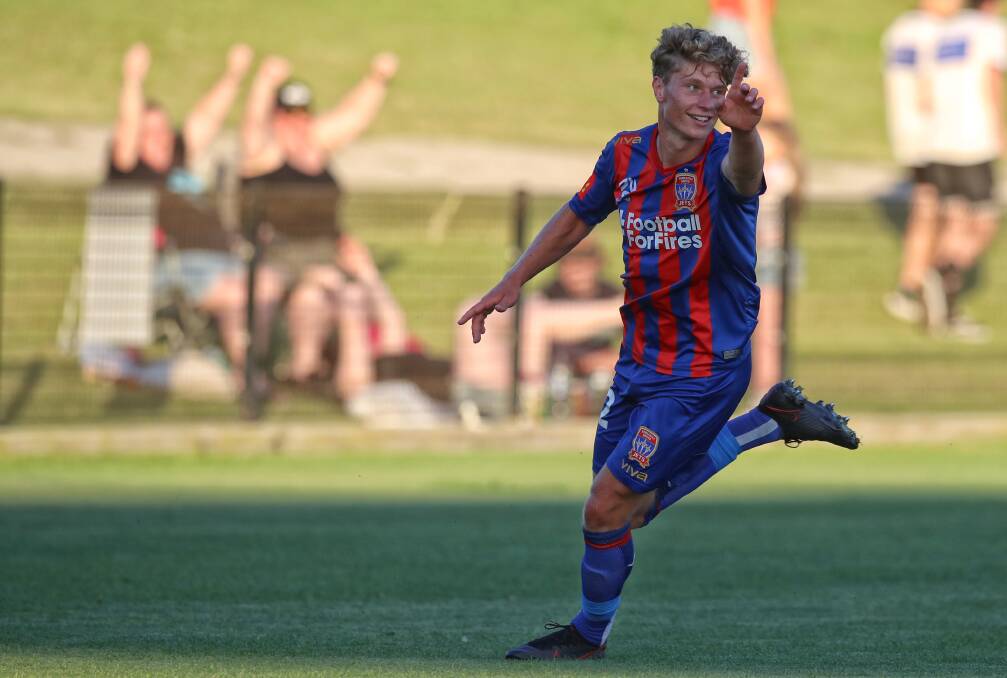 Lucas Mauragis celebrates after scoring the equaliser in the Jets' 3-all draw with Macarthur. Photo: Sproule Sports Focus