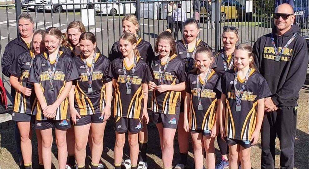 The Shoalhaven Tigers under 14 girls side after their grand final. Photo: Supplied