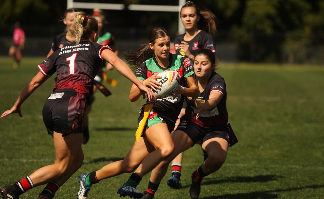 Jamberoo's Hannah Prouten evades the Kiama defence during the 2019 Group Seven women's league tag one grand final. Photo: DAVID HALL