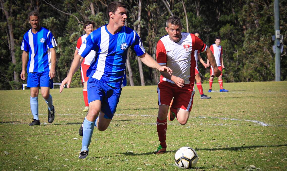 Intense match: Basin's Brian Booth attacks the ball during the reserve grade clash against Sussex. The game ended in a 0-0 draw.