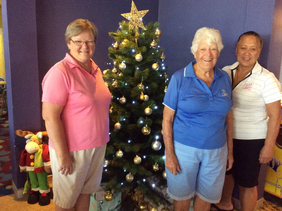 St George’s Basin Women: Winners checking out the Christmas tree, Vicki, Yvonne and Myra.