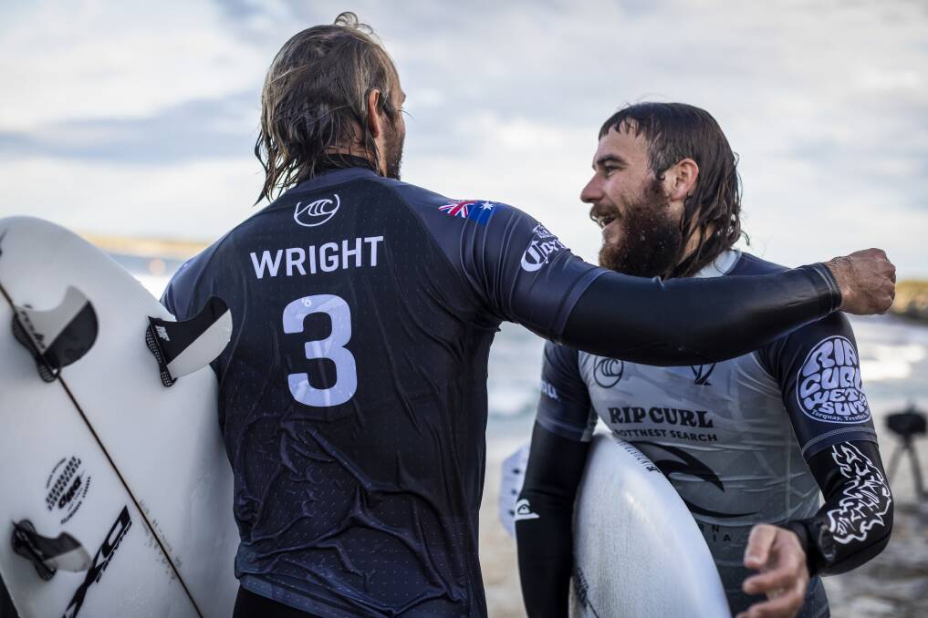 Brothers Owen and Mikey Wright embrace following their match-up at the Rottnest Search. Photo: WSL/Miers