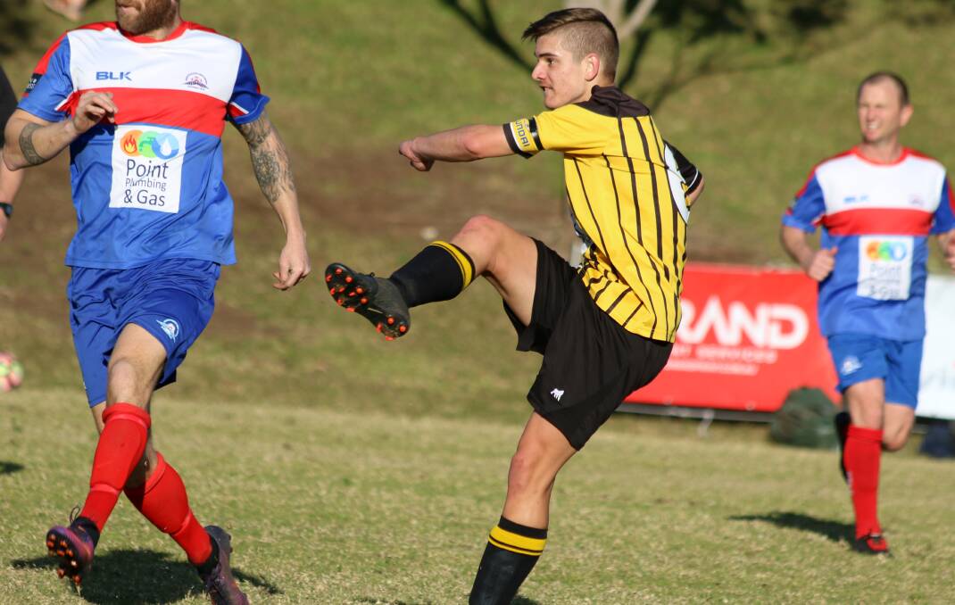 EARNING HIS STRIPES: Bomaderry Tigers' Nick Evans scored one of his team's three goals in Saturday's victory against the Gerringong Breakers, at Gerringong Oval. Photo: CATHY RUSSELL