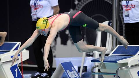 Jasmine Greenwood dives off the starting blocks during a recent event. Photo: Swimming Australia