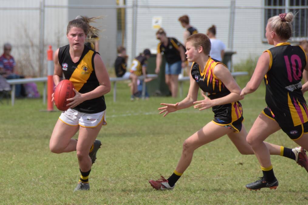 Bomaderry's Bridget Kellett takes on the Northern Districts defence. Photo: DAMIAN McGILL