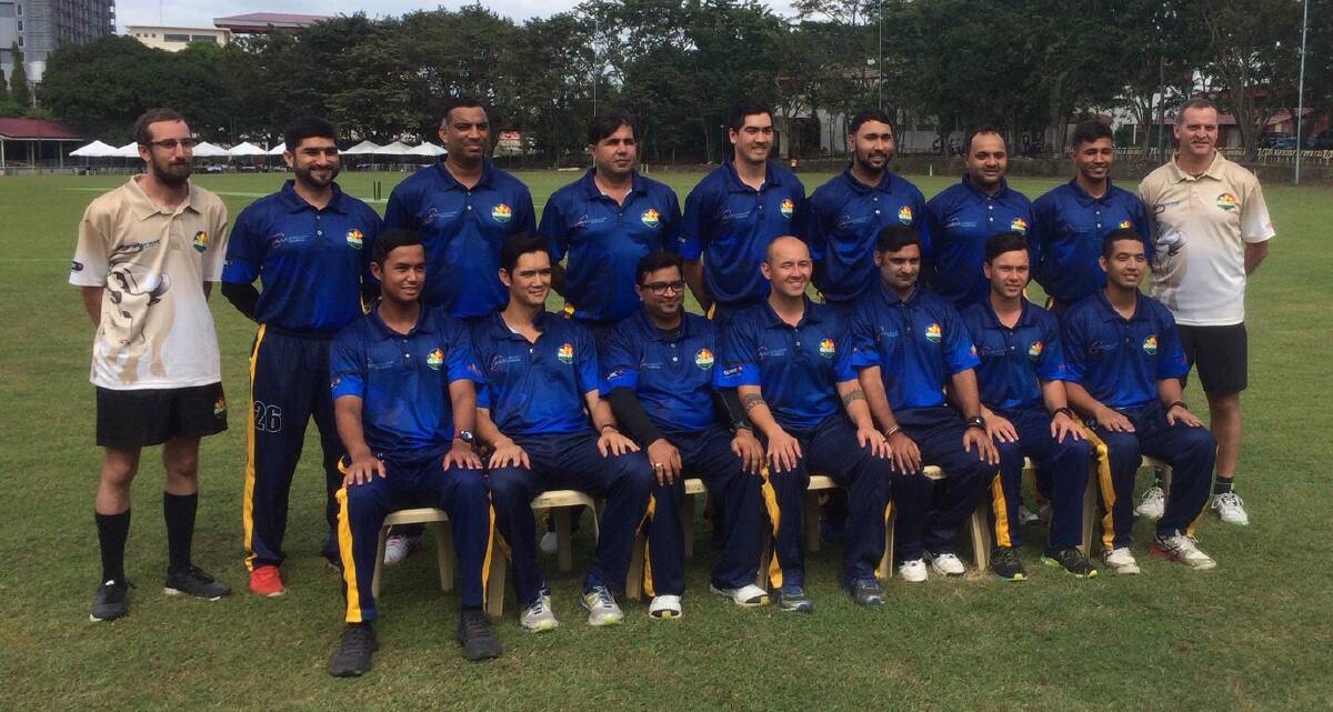 Jonathan Hill (front row, fourth from left) and his Filipino national cricket team.