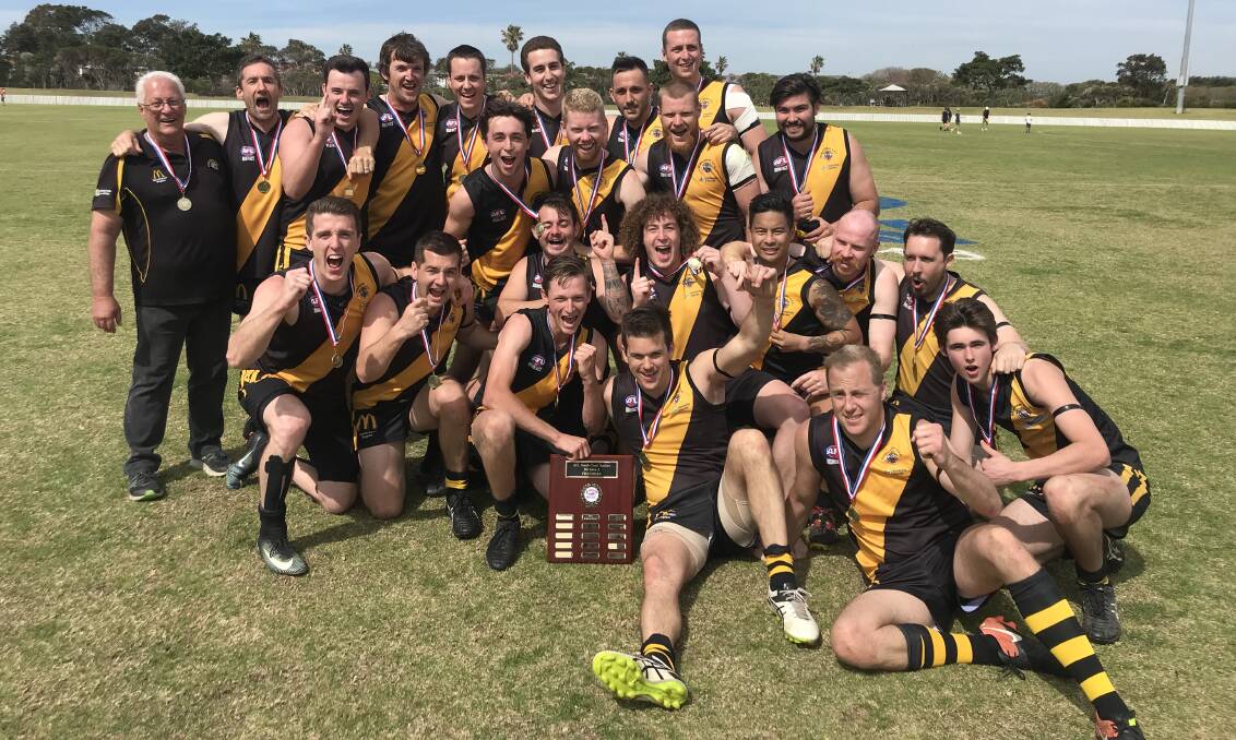The Bomaderry Tigers after they defeated the Kiama Power in the AFLSC division two men's grand final. Photo: MATT GRAHAM/AFLSC