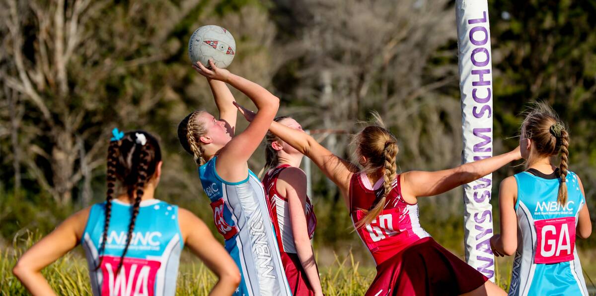 North Nowra-Bomaderry's Paige Nicholls takes a shot during a recent Shoalhaven Netball Association match. Photo: GIANT PICTURES