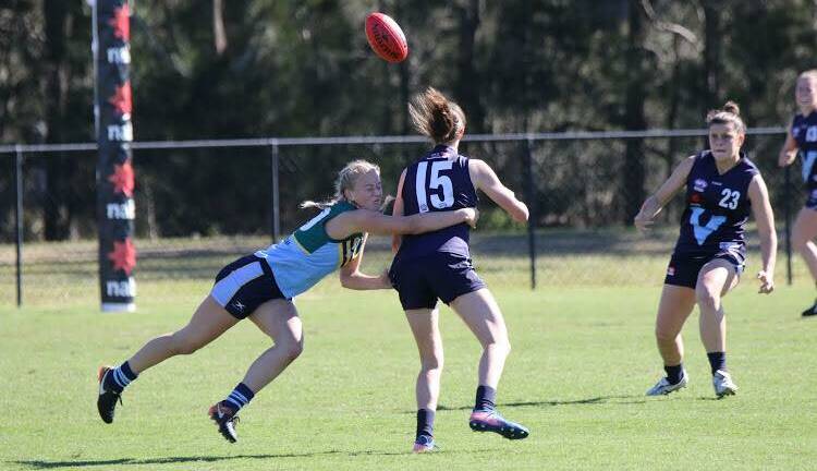 Sophie Phillips makes a tackle against Victoria Country. Photo: Dave Pease