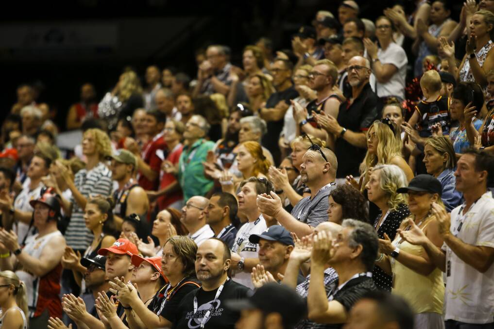 Illawarra Hawks fans clap during a 2019/20 home game at the Sandpit. Photo: Sylvia Liber