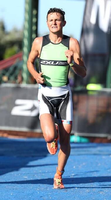 Troy Whittington pushes himself to the limits in St Kilda. Photo: 2XU Triathlon Series