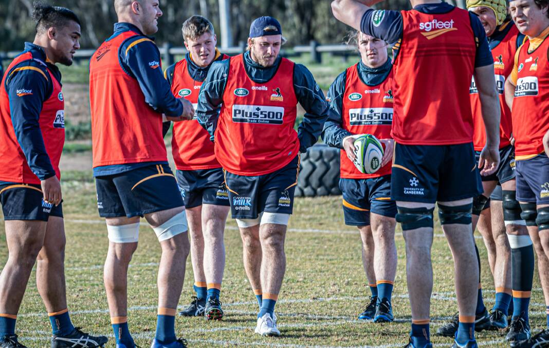 Will Miller (centre) during a recent Brumbies training sessions. Photo: Karleen Minney