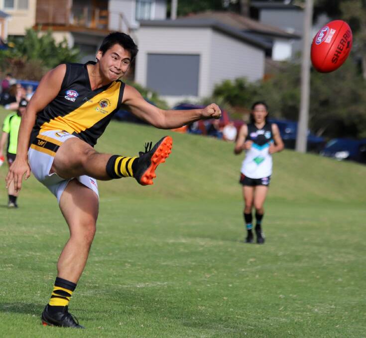 Bomaderry Tigers' Leslie Wardale gets a kick away against the Kiama Power in 2019. Photo: Team Shot Studios