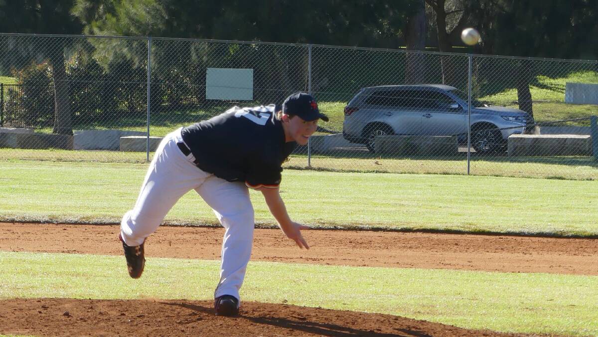 Stephen Pearson pitches for CIS against CCC at the 2021 All School baseball carnival. Photo: Lisa Pearson