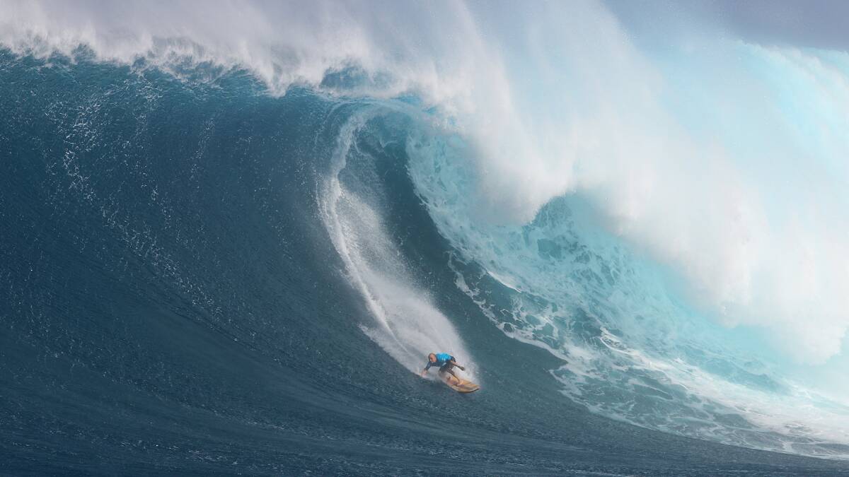 Ulladulla's Russell Bierke rides at wave at Hawaii's Jaws event. Photo: WSL/Erik Aeder
