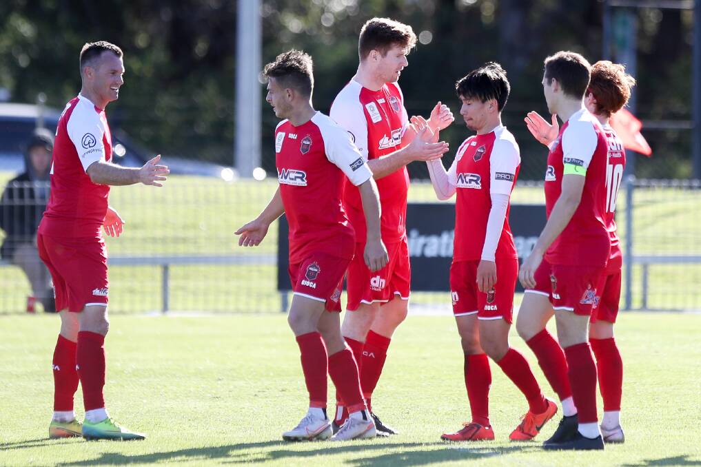 Chris Price (left) and his Wollongong Wolves lost 3-1 to Sydney United 58 at the weekend. Photo: Robert Peet