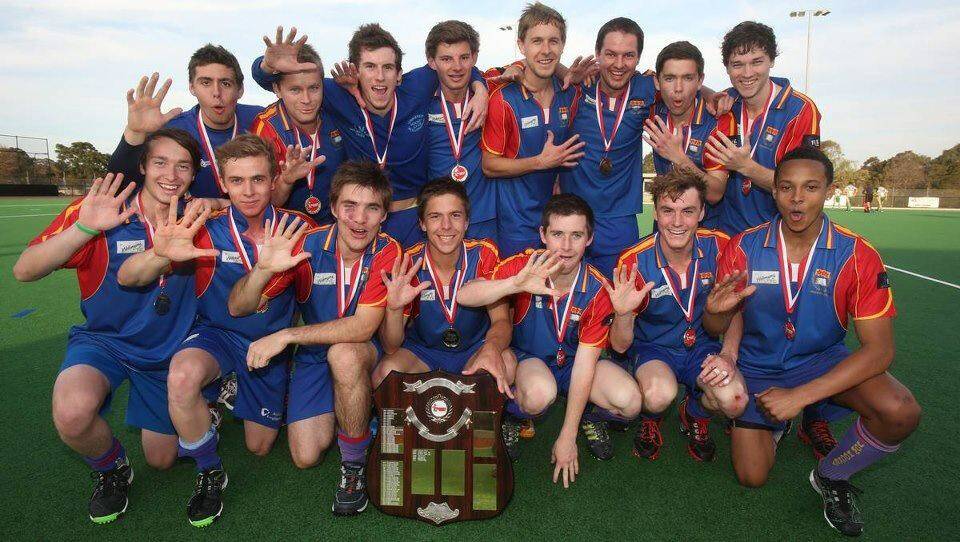 Kurt Ogilvie (back row, fourth from right) and his University of Wollongong side after winning their fifth Illawarra premiership in 2012. Photo: Supplied