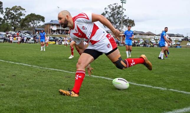 Nowra-Bomaderry's Nathan Falzon scores a try for Malta against Italy. Photo: John Bonanno