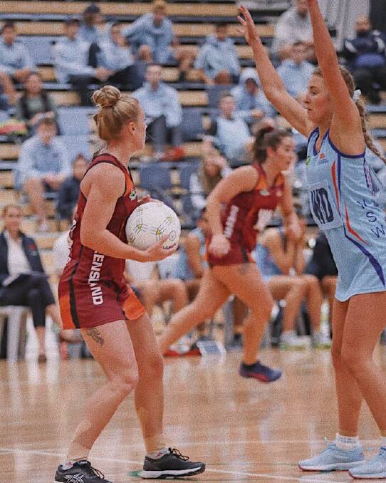 Elecia Parrott plays defence for NSW against Queensland. Photo: ClusterPix Photography