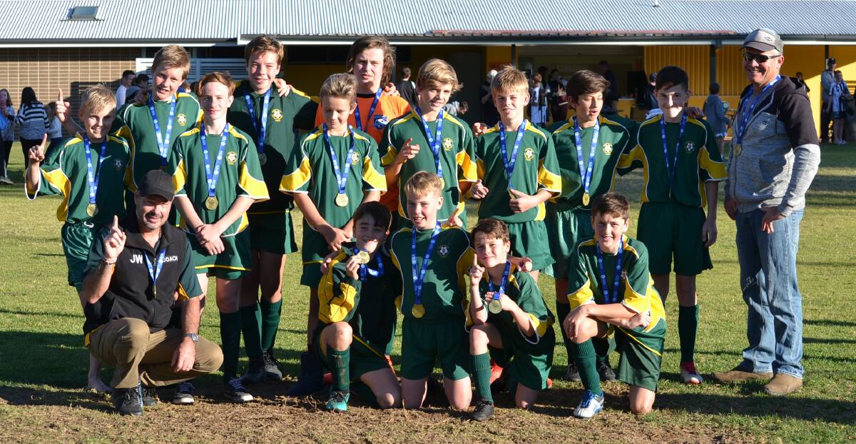 CHAMPIONS: The Shoalhaven under 13s represntative football side after their victory at the Country Cup. Photo: MICHELLE TREWEEKE