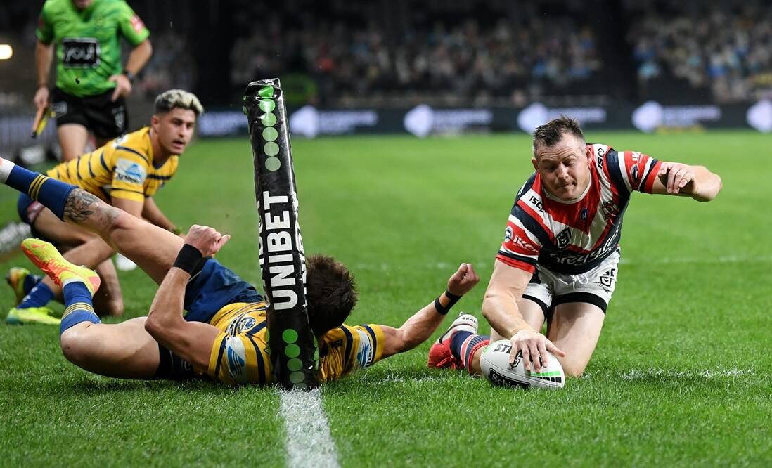 Brett Morris scores his team's first try against the Eels on Saturday. Photo: Roosters Media