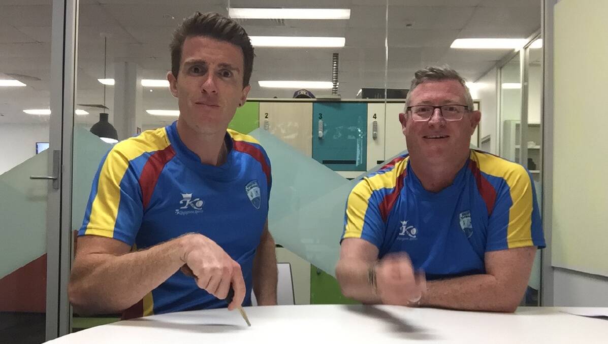 Courtney Ward and Rob Crawford in their Greater Illawarra Cricket Zone shirts.