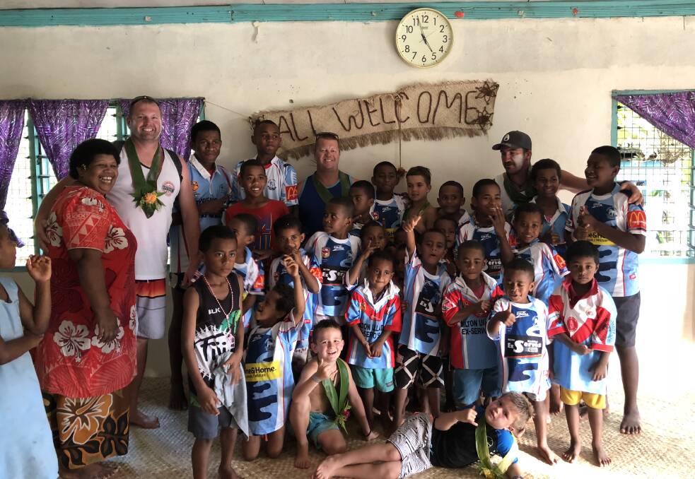 Dogs donate jerseys to island nation