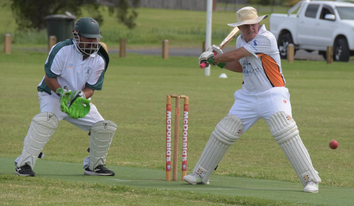 EYES ON THE PRIZE: Nowra wicketkeeper Grahame Morris and Batemans Bay's Tom Purcell watch the ball on Saturday at Lyrebird Park. Photo: DAMIAN McGILL