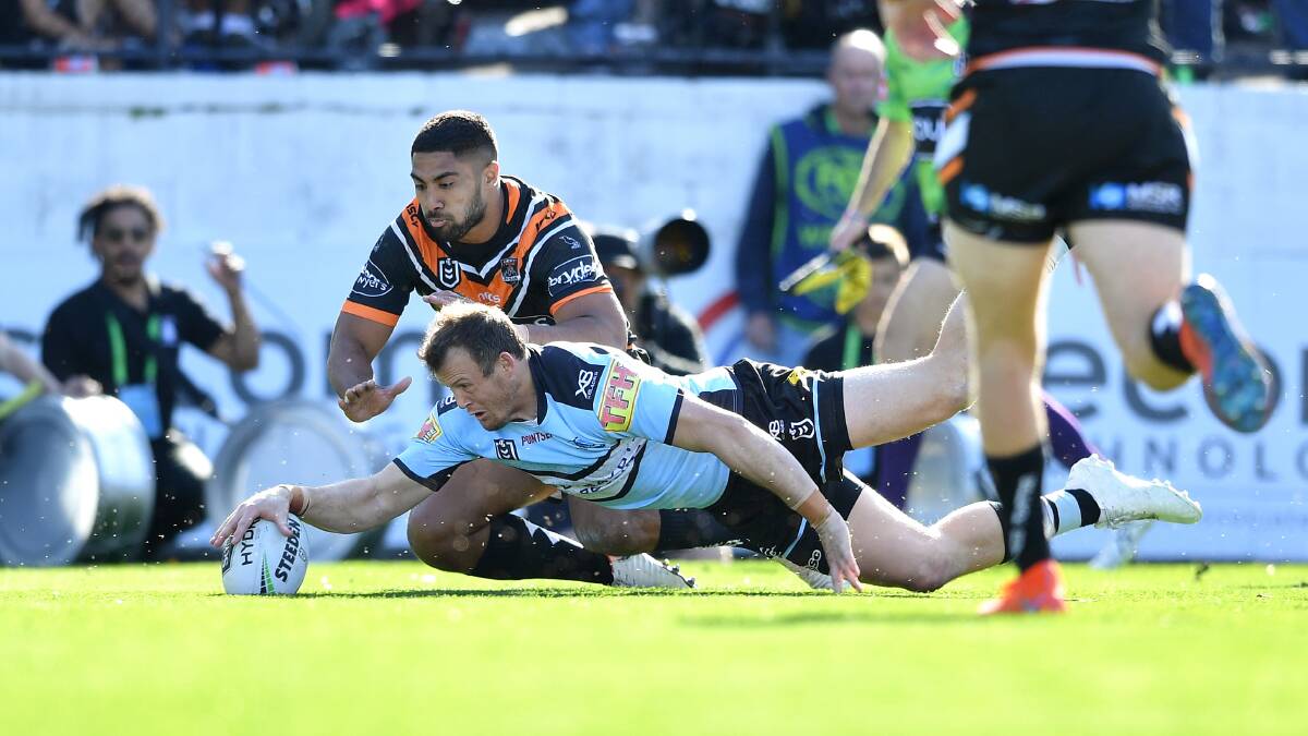 Josh Morris scored for the Sharks against the Tigers in 2019. Photo: NRL Imagery