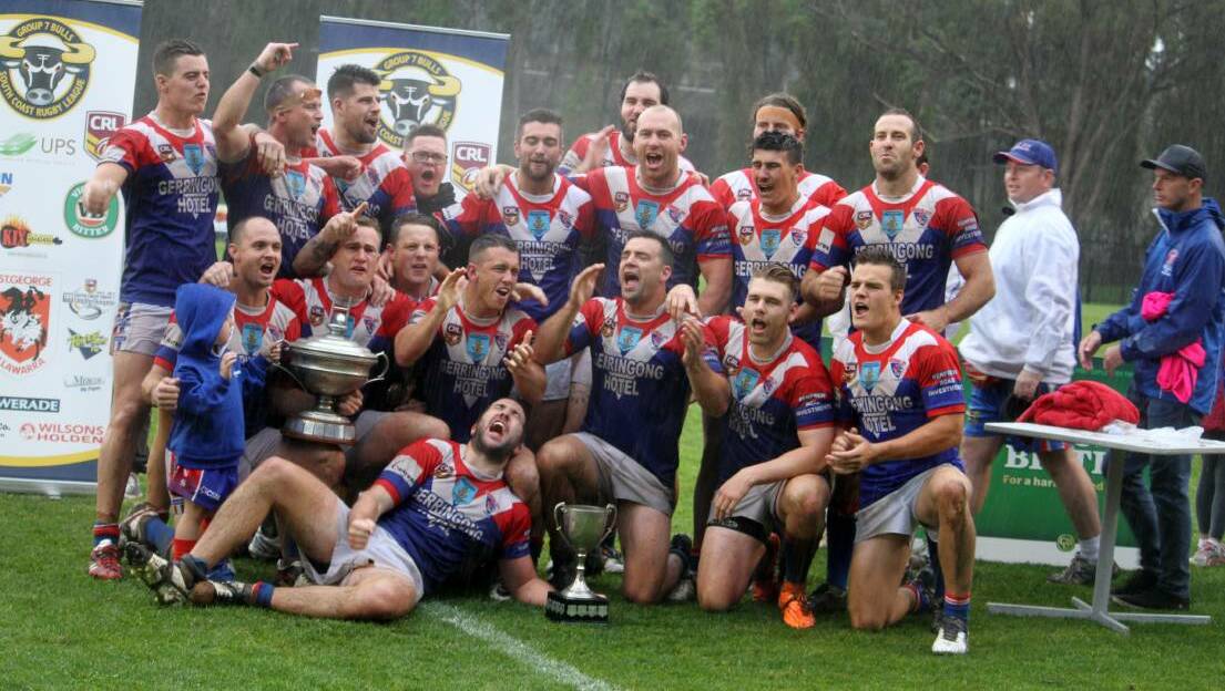 Kal Collins (front row, third from left) and his Gerringong Lions celebrate their 2016 Group Seven premiership. Photo: DAVID HALL