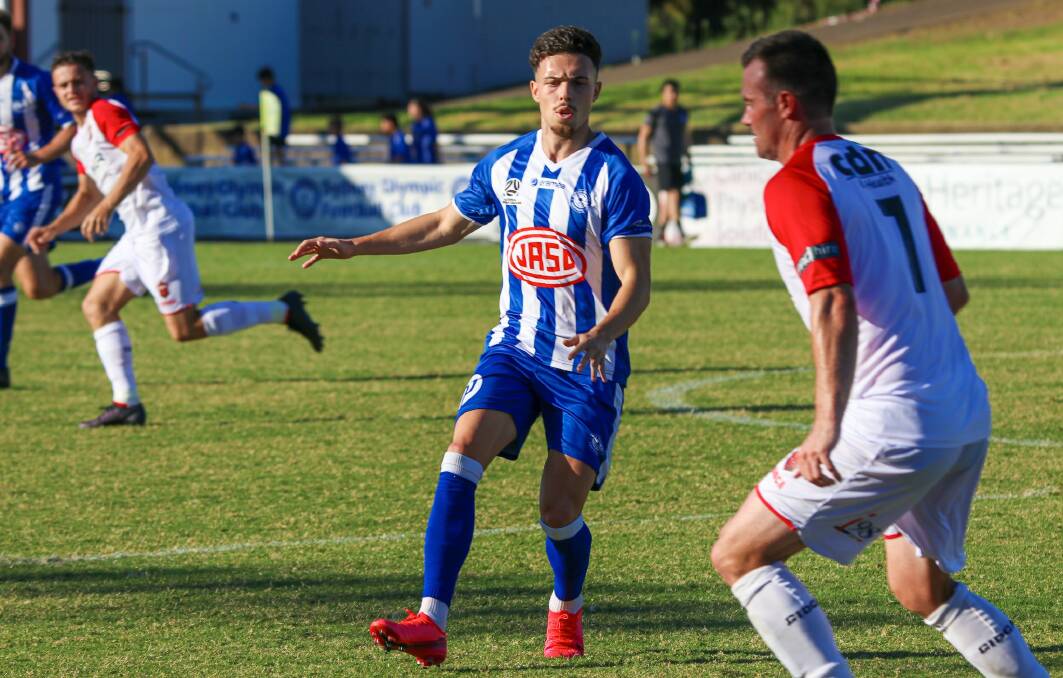 Chris Price (seven) defends against Sydney Olympic at the weekend. Photo: SOFC MEDIA