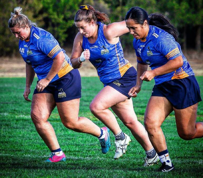 STAMPEDE: Harriet Elleman (centre) trains with her teammates Paige Penning and Tania Afamasaga during the pre-season. Photo: BRUMBIES MEDIA