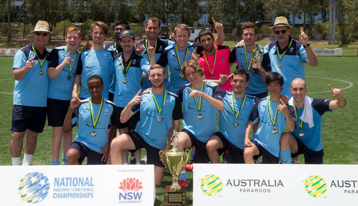 WINNERS: Ben Atkins (back row, second from right), Zac Jones (front row, first on right) and their NSW team. Photo: Damian Briggs/FNSW