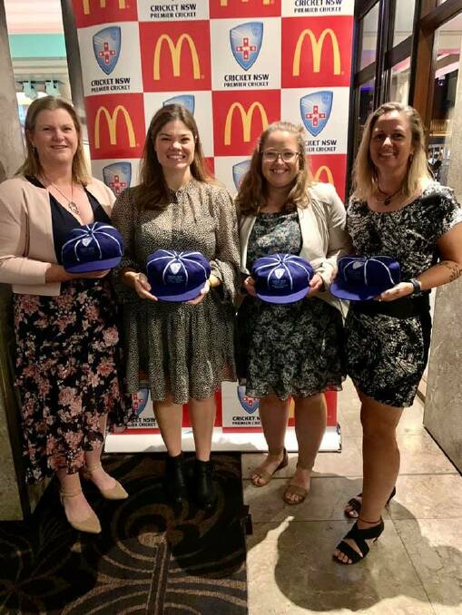Slayers' Joanne Kelly, Cailyn Fountain, Jaclyn Vickery and Abby Burrows with the team of the year caps. Photo: Supplied