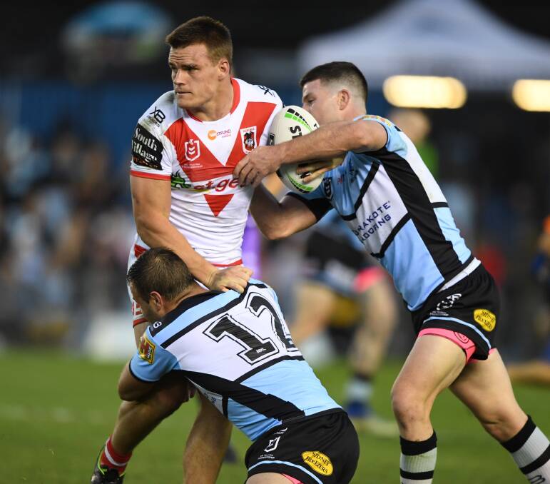 St George Illawarra's Jackson Ford looks for a pass against Cronulla-Sutherland in 2019. Photo: DRAGONS MEDIA