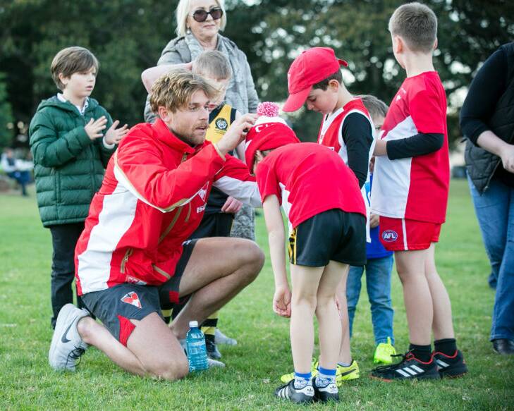 GIVING BACK: Sydney's Dane Rampe at a recent clinic. Photo: SWANS MEDIA