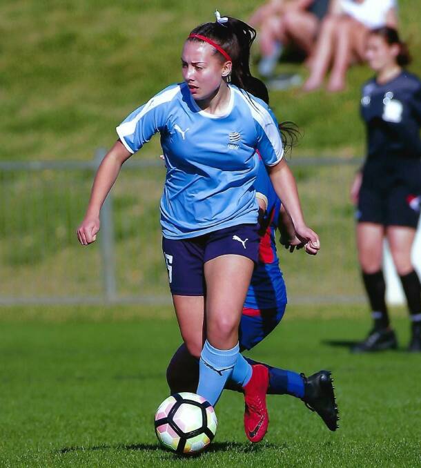 INTERNATIONAL EXPOSURE: Vincentia High School's Bronte Wright, in action here for NSW Country at the Nationals Identification Tournament, is headed to her first overseas tournament in the United States.