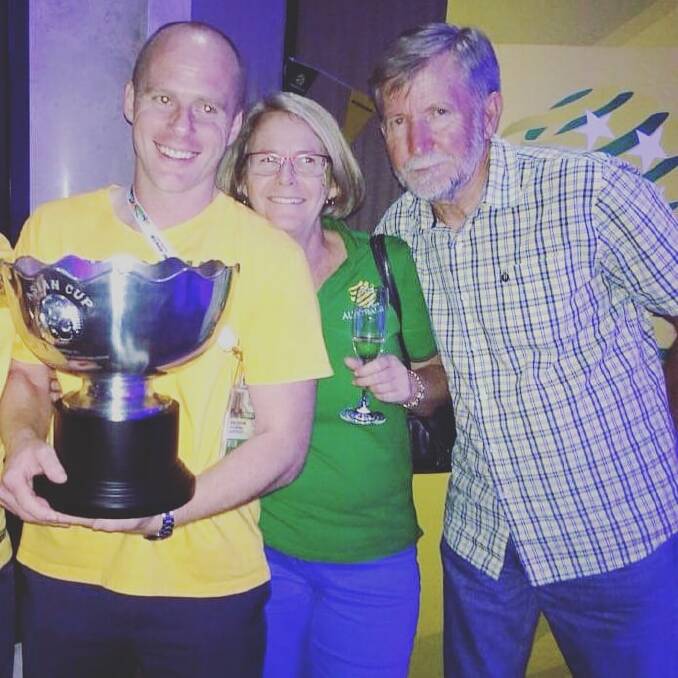 Joel Freeme and his parents after winning the Asian Cup. Photo: Supplied