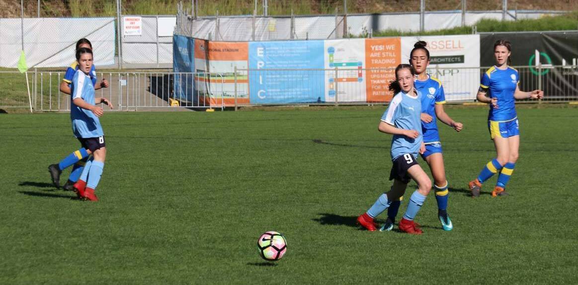 Poppy Tay and Ella Hewson in action for NSW Country. Photo: NORTHERN NSW FOOTBALL