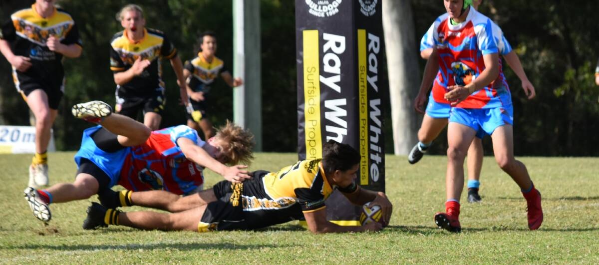 Triple treat: Jarrah McLeod goes in for his third try of the day for Nowra Warriors U16s against Ulladulla.