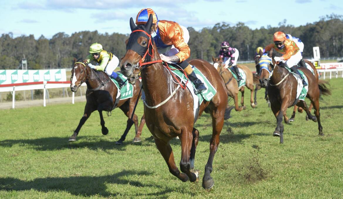Jospeh Pride's Miss Baltimore, ridden by Blaike McDougall, powers to the line during Friday's 1100-metre maiden plate at Nowra. Photo: BradleyPhotos.com.au