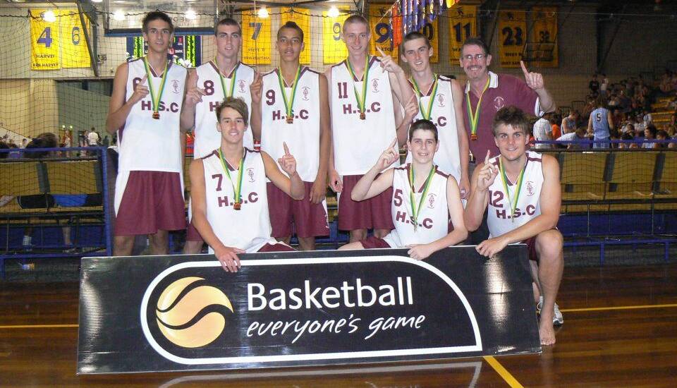 Xavier Cooks (nine) and his Holy Spirit College team after their Australian title.