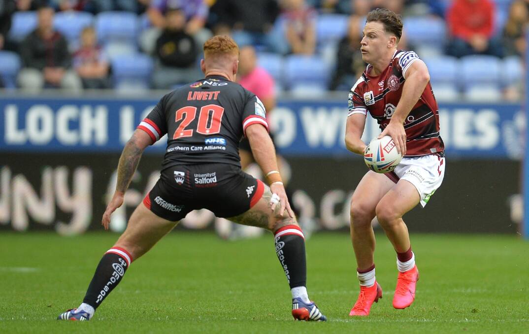 Wigan's Jai Field shapes to pass against Salford. Photo: Warriors Media
