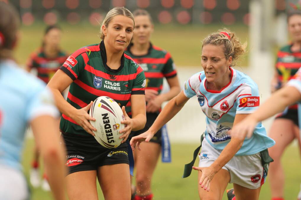 Jamberoo's Chelsea Tout tries to avoid being tagged by Milton-Ulladulla's Cheyanne Hatch in the 2020 women's league tag one decider. Photo: David Hall