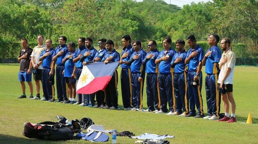 Jonathan Hill (third from left) and his Filipino national cricket team.