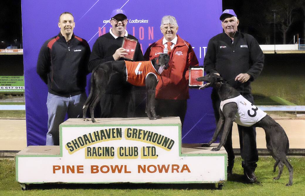 Zippy Ethics and Bogan Doonie on the podium at the Nowra Greyhound Racing Club. Photo: Natalie Winter