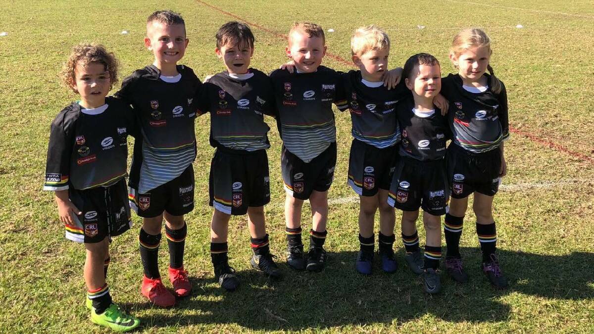 The Sussex Inlet Panthers under 6s black side.
