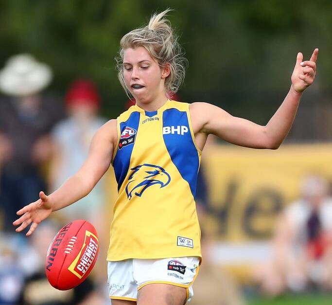 Maddy Collier kicks the ball to a West Coast teammate on Sunday. Photo: EAGLES MEDIA