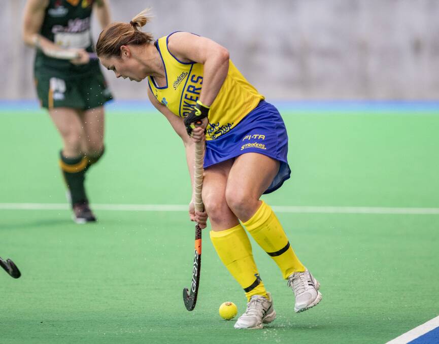 Mollymook's Kalindi Commerford in action for the Strikers against Tasmania. Photo: Hockey Australia/Click In Focus